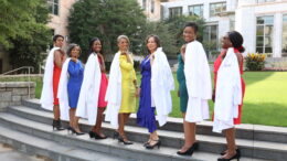 Photos of (from left to right) Dr. Jennifer Christie, Dr. Jada Bussey-Jones, Dr. Stacy Higgins, Dr. Kimberly Manning, Dr. Janice Lea, Dr. Ugochi Ohuabunwa, and Dr. Modele Ogunniyi holding their lab coats